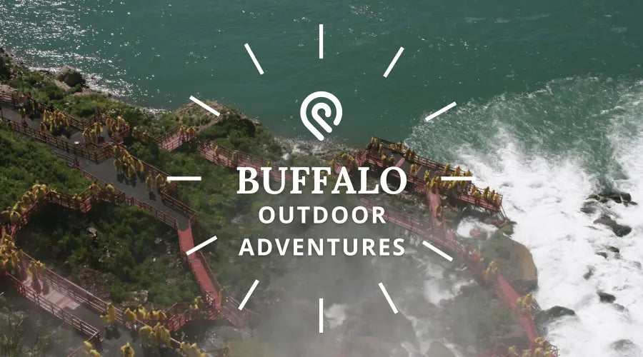 Overhead view of people in raincoats walking near Niagara Falls, labeled 'Buffalo Outdoor Adventures'.