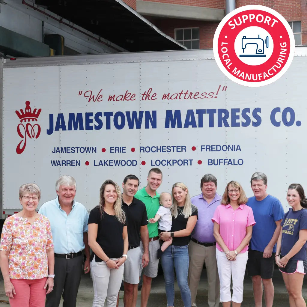 Mattress family outside the factory with delivery truck, 'We make the mattresses'.