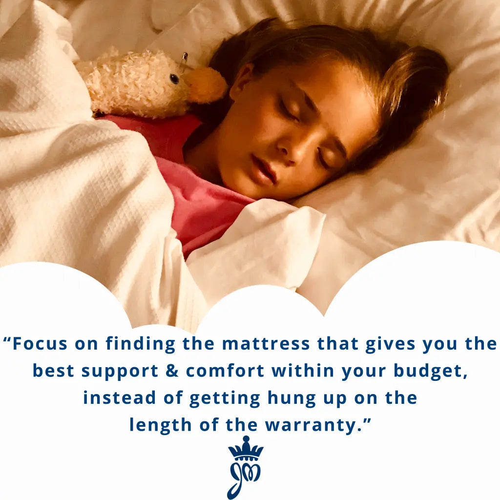 Girl sleeping soundly with stuffed animal, emphasizing the importance of choosing the right mattress.
